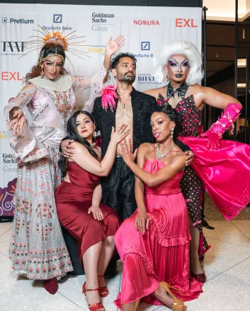 Five drag performers in dramatic gowns and headpieces posing together at Pyar is Pyar.