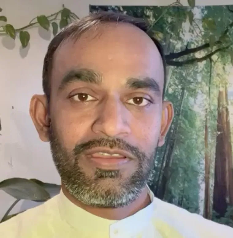 Dr. Tushar Bhagat speaking during the Buddha Jayanti conversation.